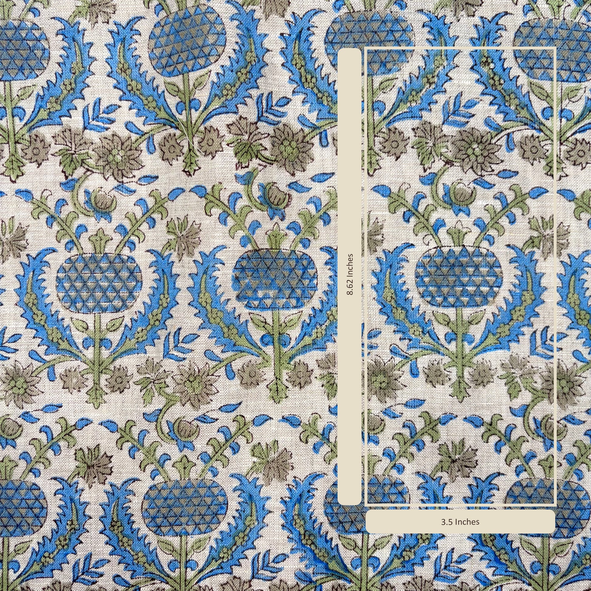 Fabric with blue and green floral pattern and a ruler for scale.