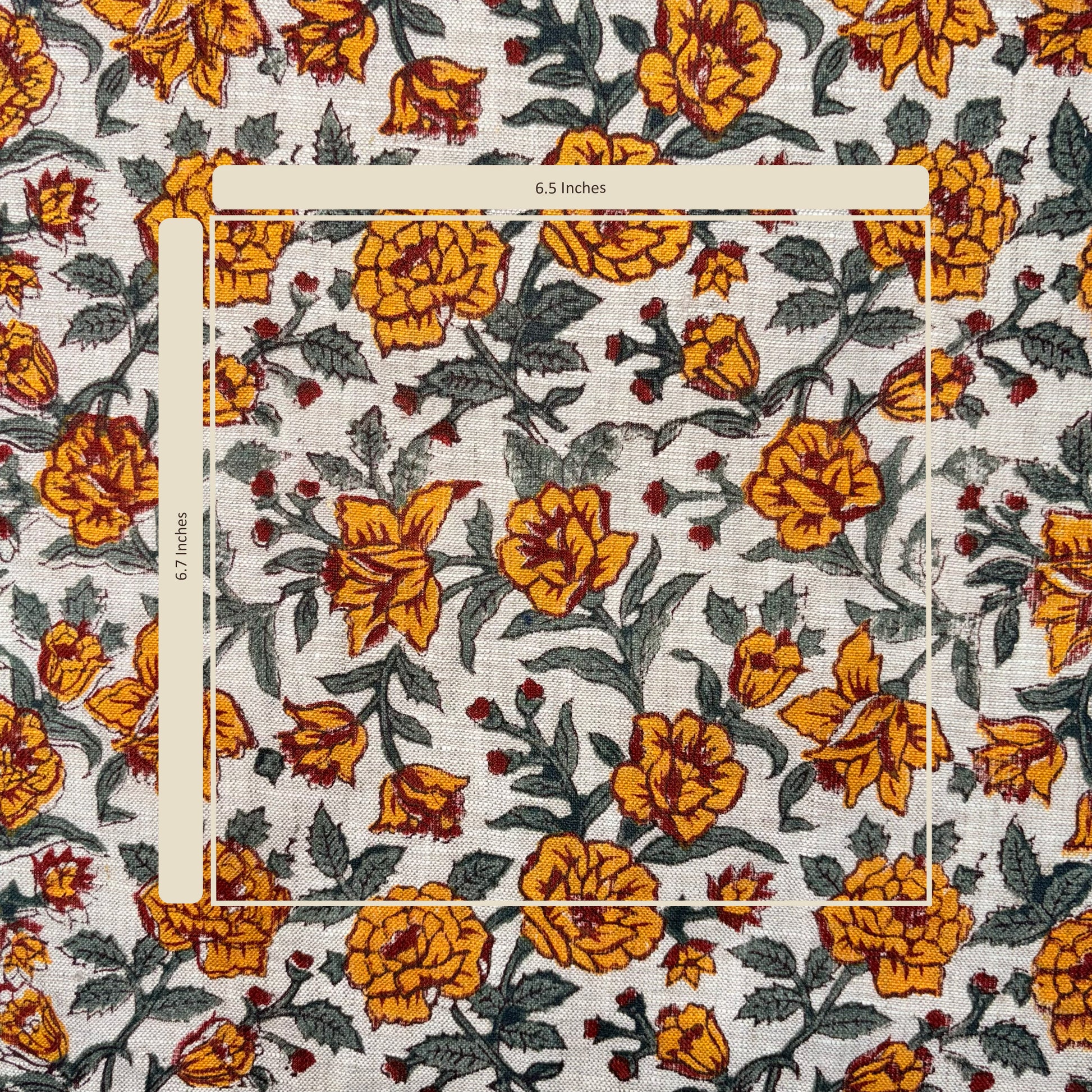 Floral patterned fabric with a ruler for scale on a grey background