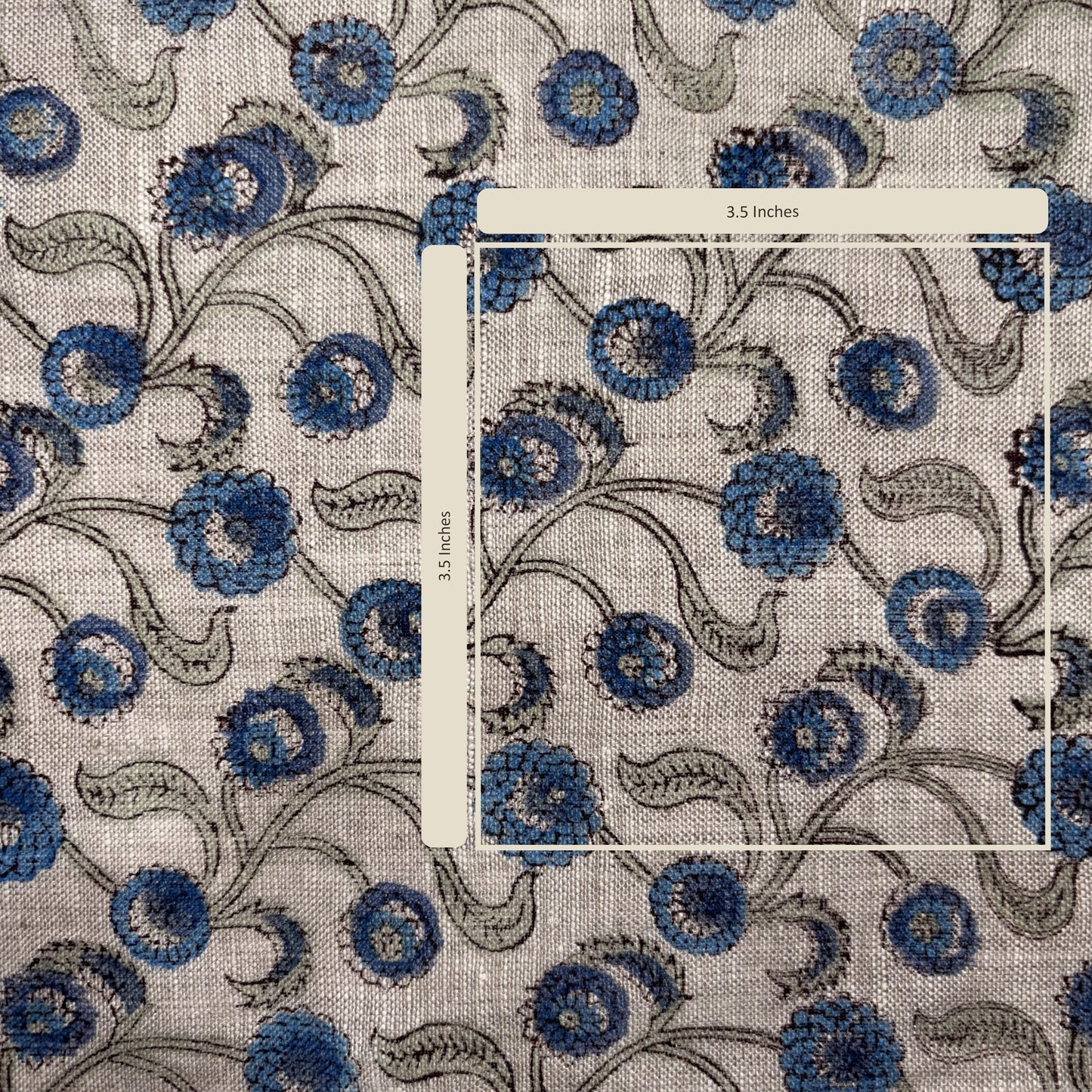 Patterned fabric with a blue floral design on a grey background