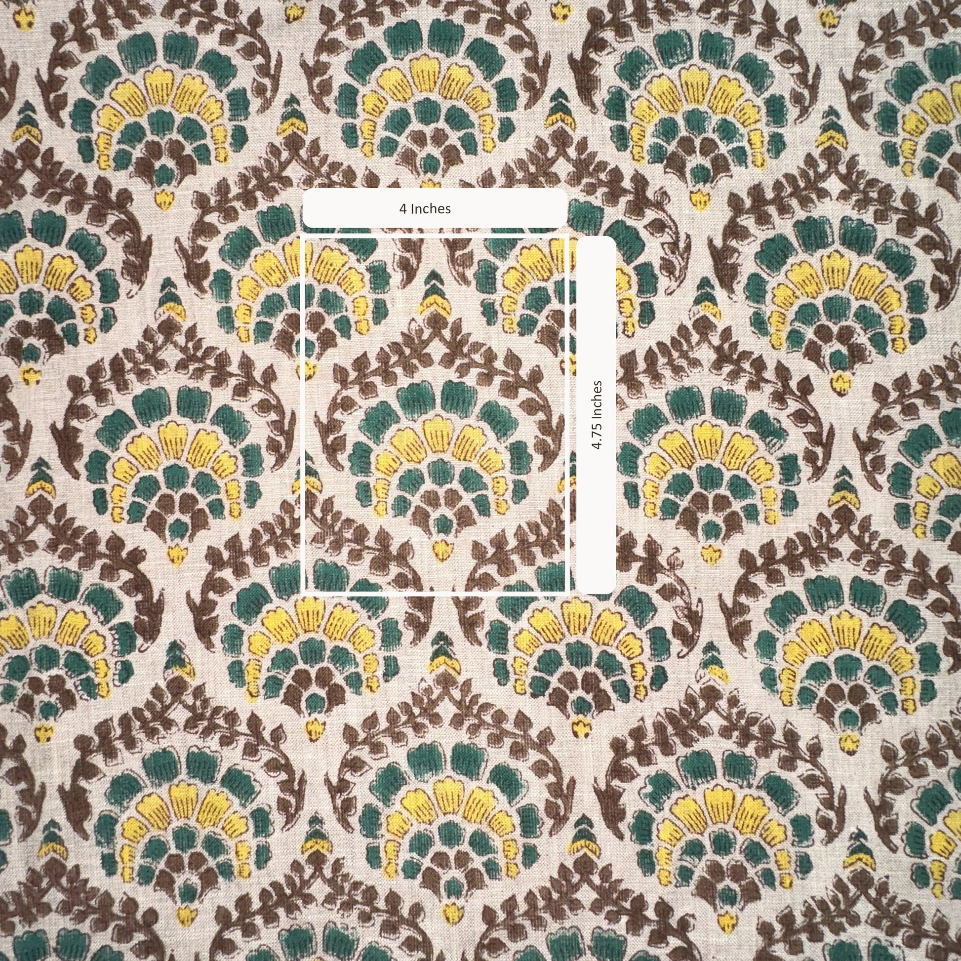 Patterned fabric with green, yellow, and brown design on a grey background