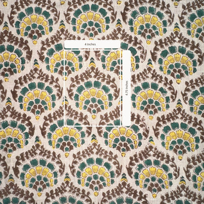 Patterned fabric with green, yellow, and brown design on a grey background