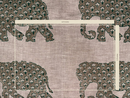 Textile with floral pattern and measurement scale on a grey background