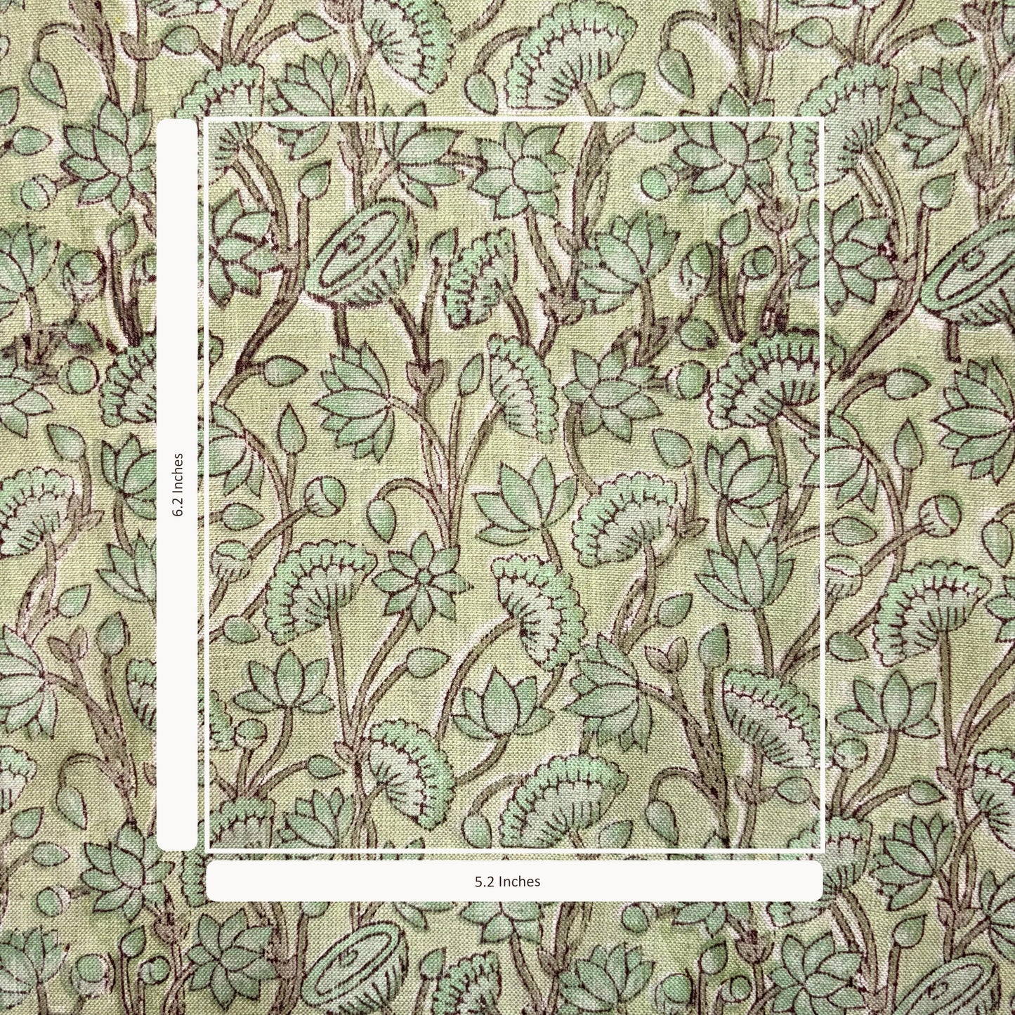 Floral patterned fabric with a scale bar indicating dimensions