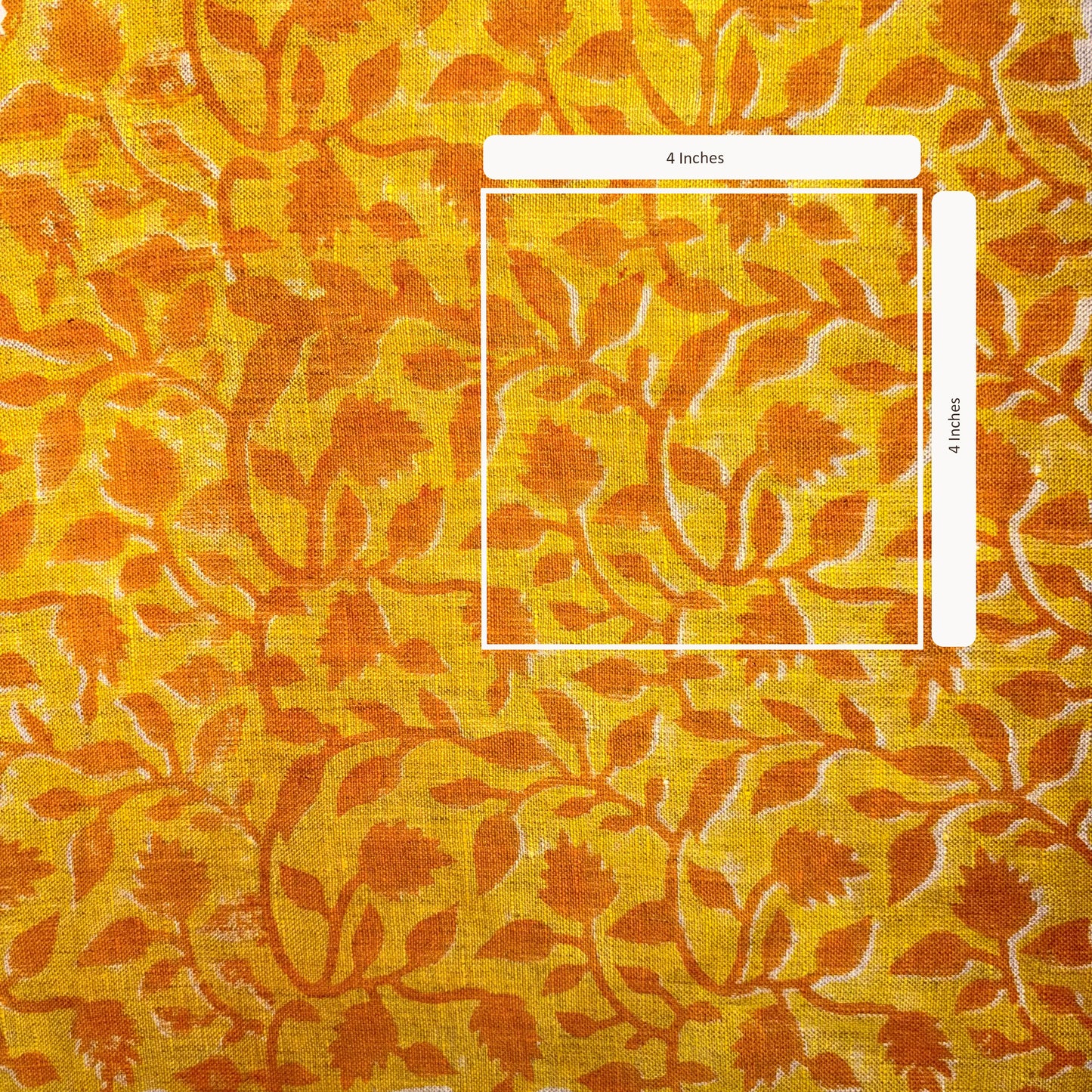 Floral patterned fabric with a measurement overlay on a yellow background