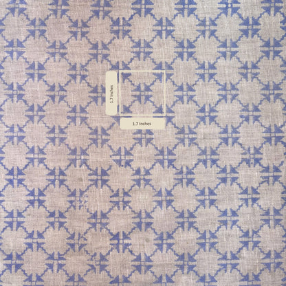 Fabric with blue and beige geometric pattern and measurement label.