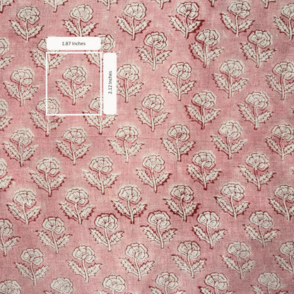 Floral patterned fabric with measurements on a pink background