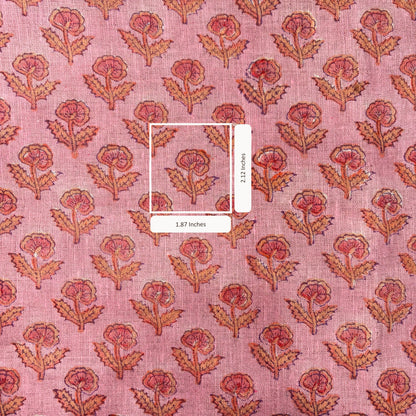 Pink fabric with floral pattern and measurement label