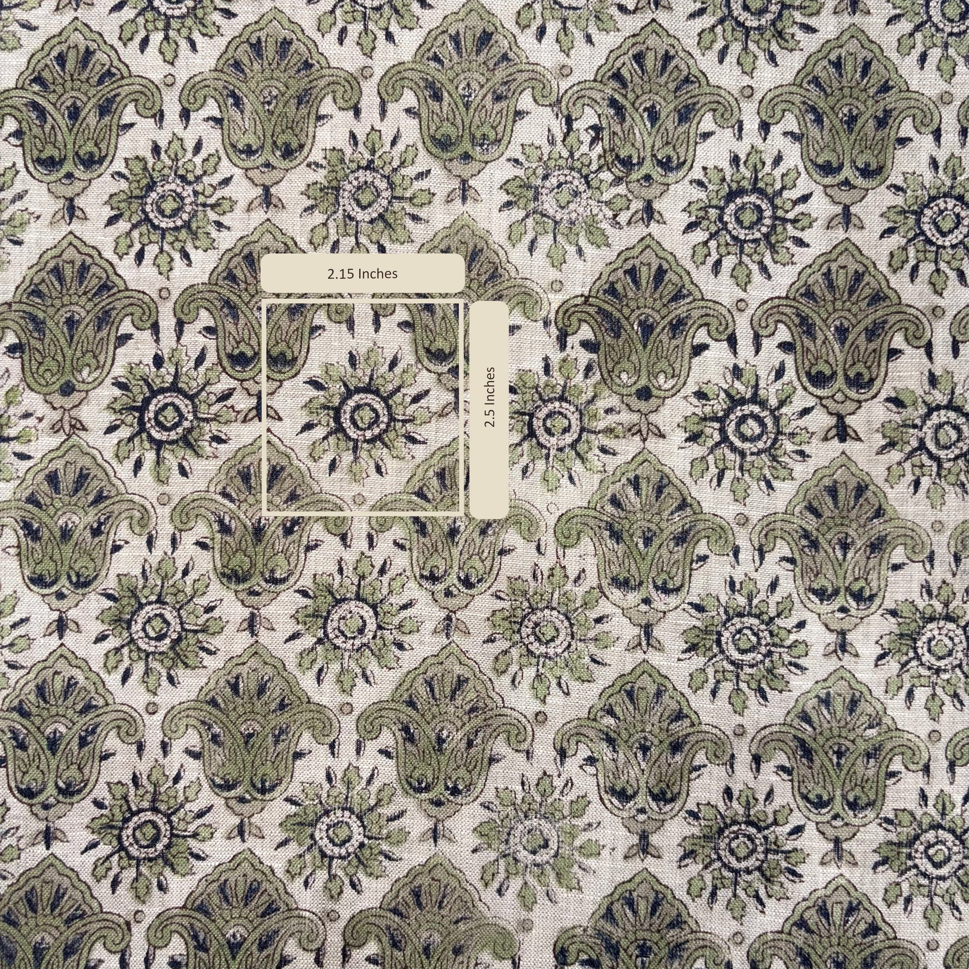 Patterned fabric with green and brown design on a grey background