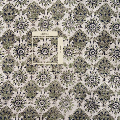 Patterned fabric with green and brown design on a grey background