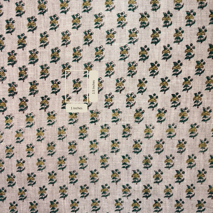 Fabric with a small floral pattern on a grey background