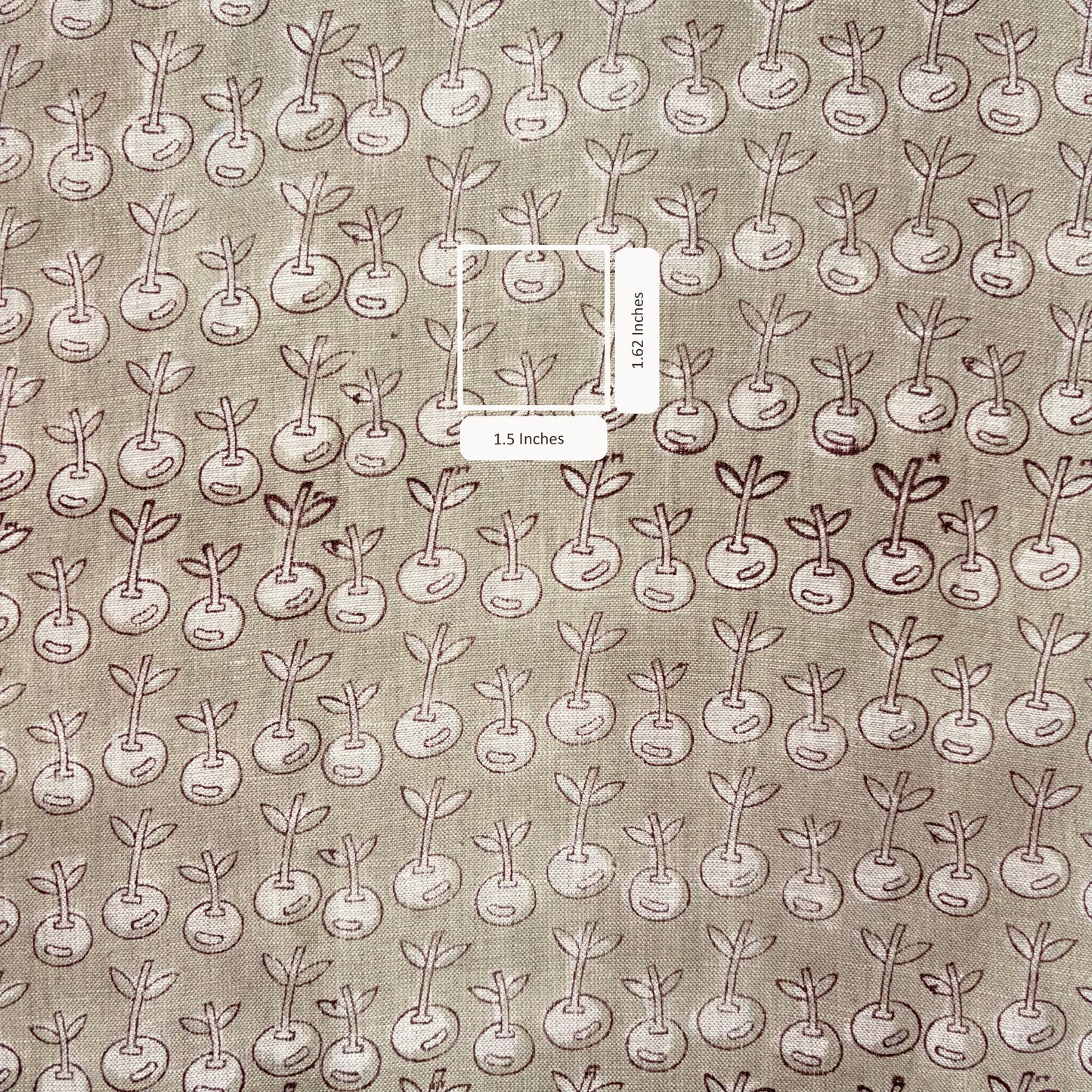 Pattern of small plants on a grey fabric background