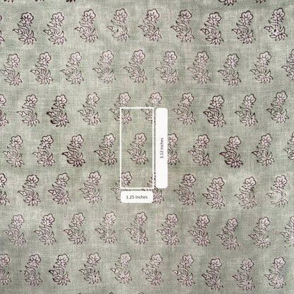 Fabric with a subtle floral pattern on a neutral background