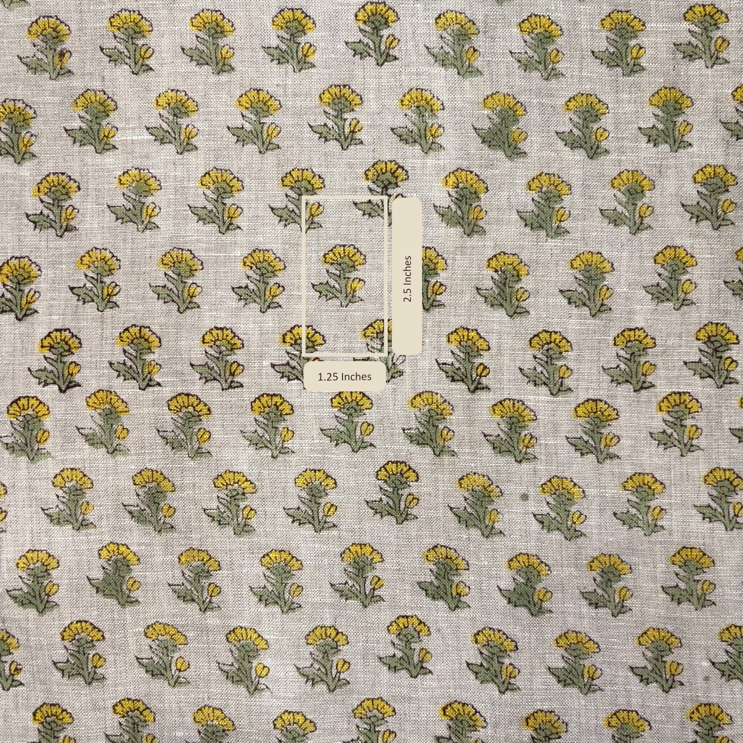 Fabric with yellow and green floral pattern on a gray background