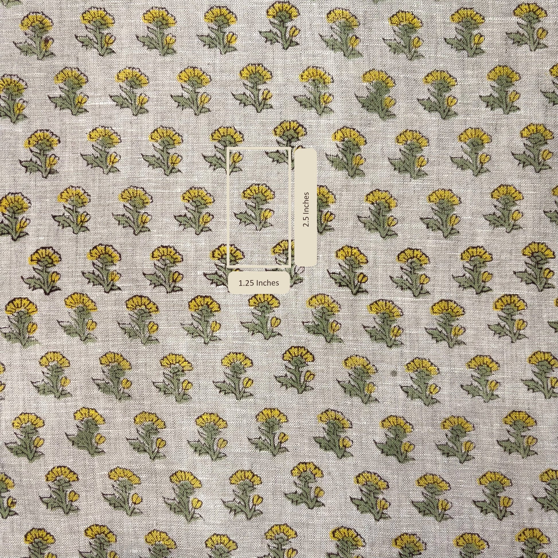 Fabric with yellow and green floral pattern on a gray background