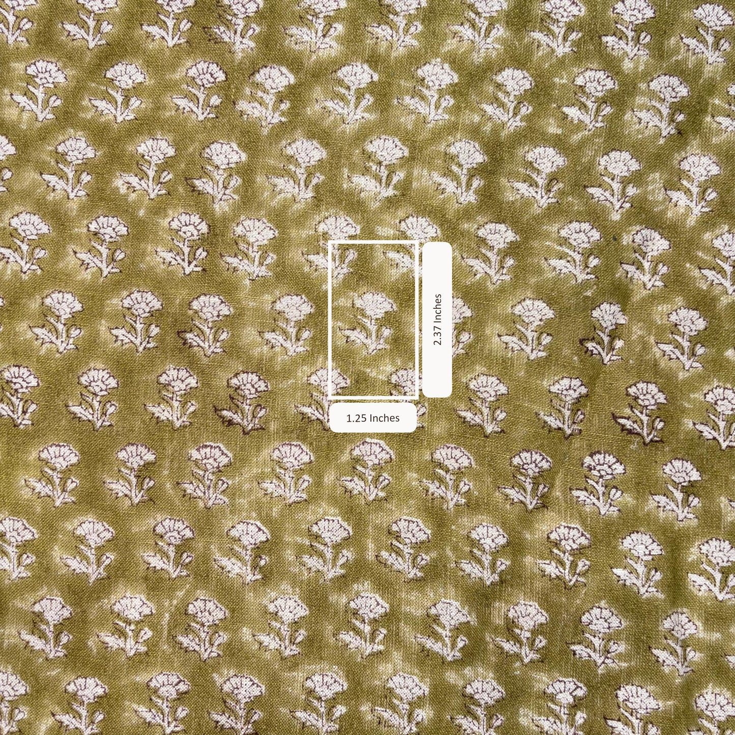 Fabric with white floral pattern on a green background