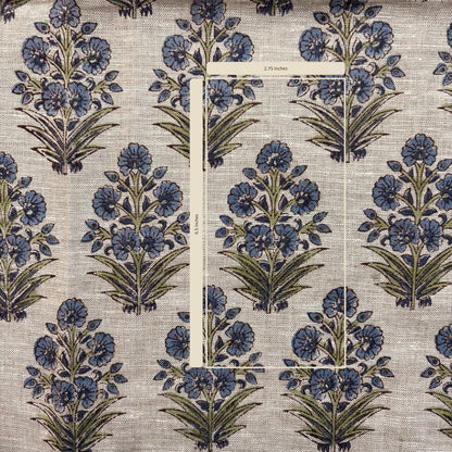 Floral pattern with blue flowers and green leaves on a textured grey background