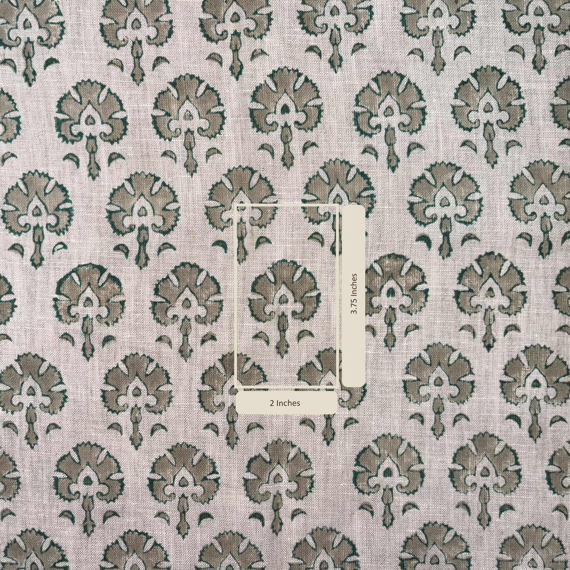 Fabric with a repeating pattern of green floral designs on a grey background