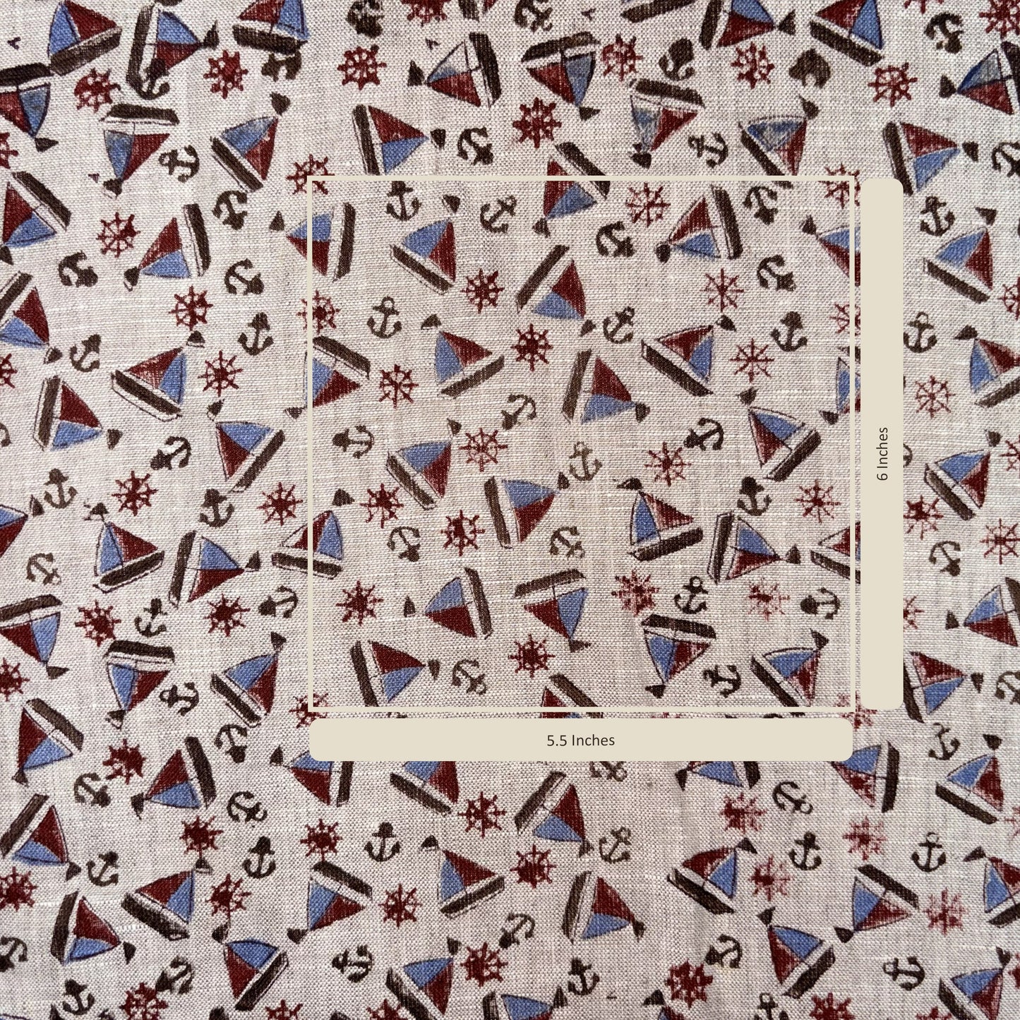 Nautical pattern fabric with anchors, stars, and triangles on a grey background