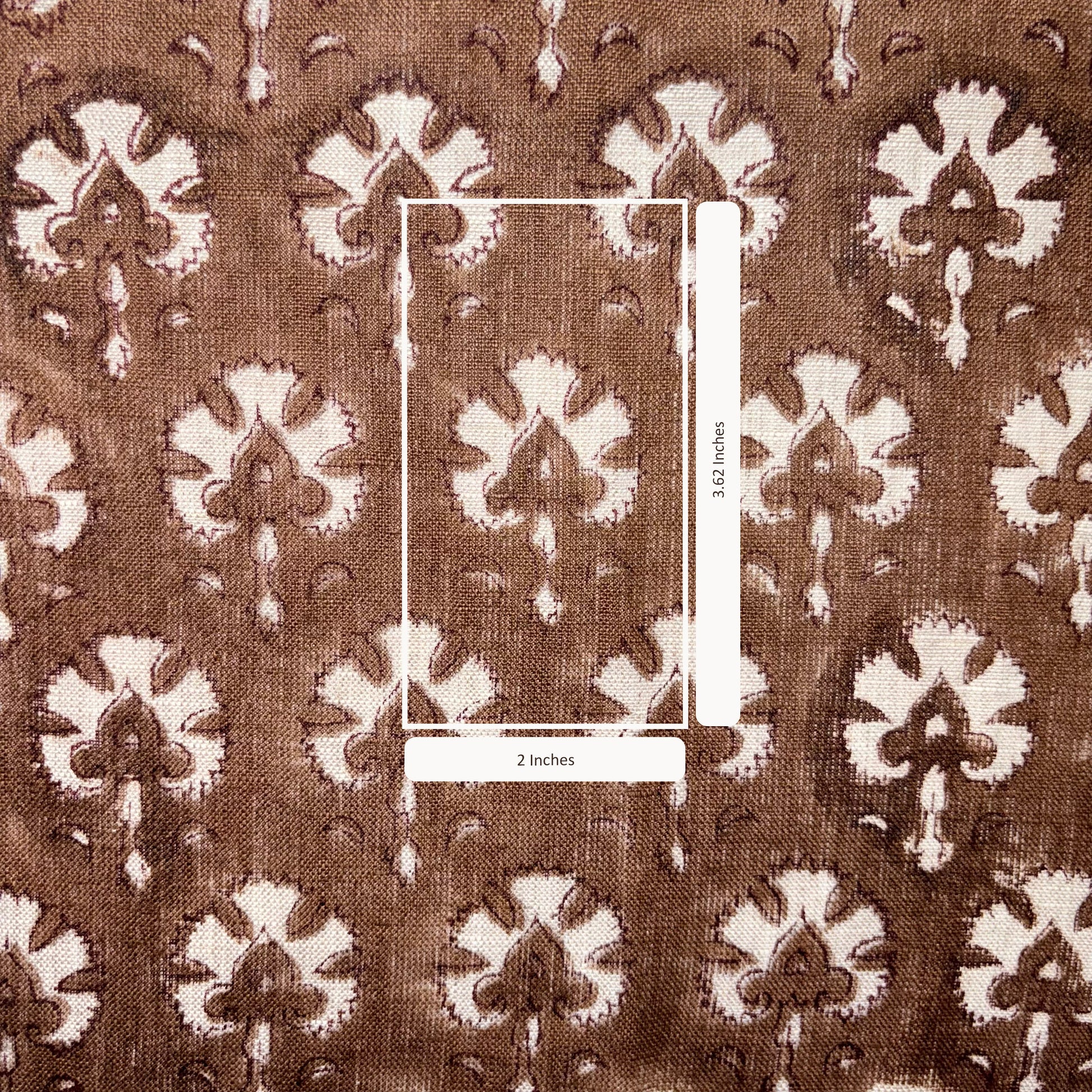 Brown fabric with white floral pattern and measurement scale
