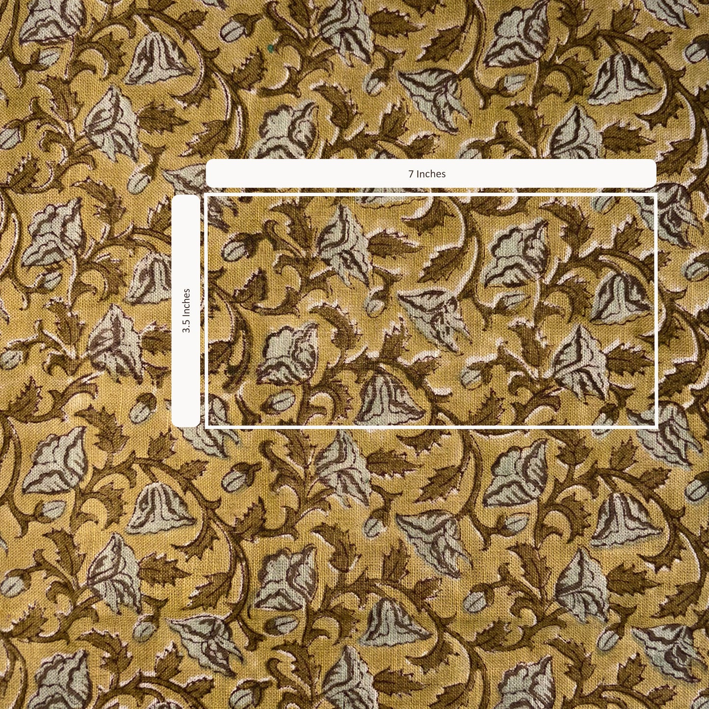 Patterned fabric with a measurement overlay on a yellow background