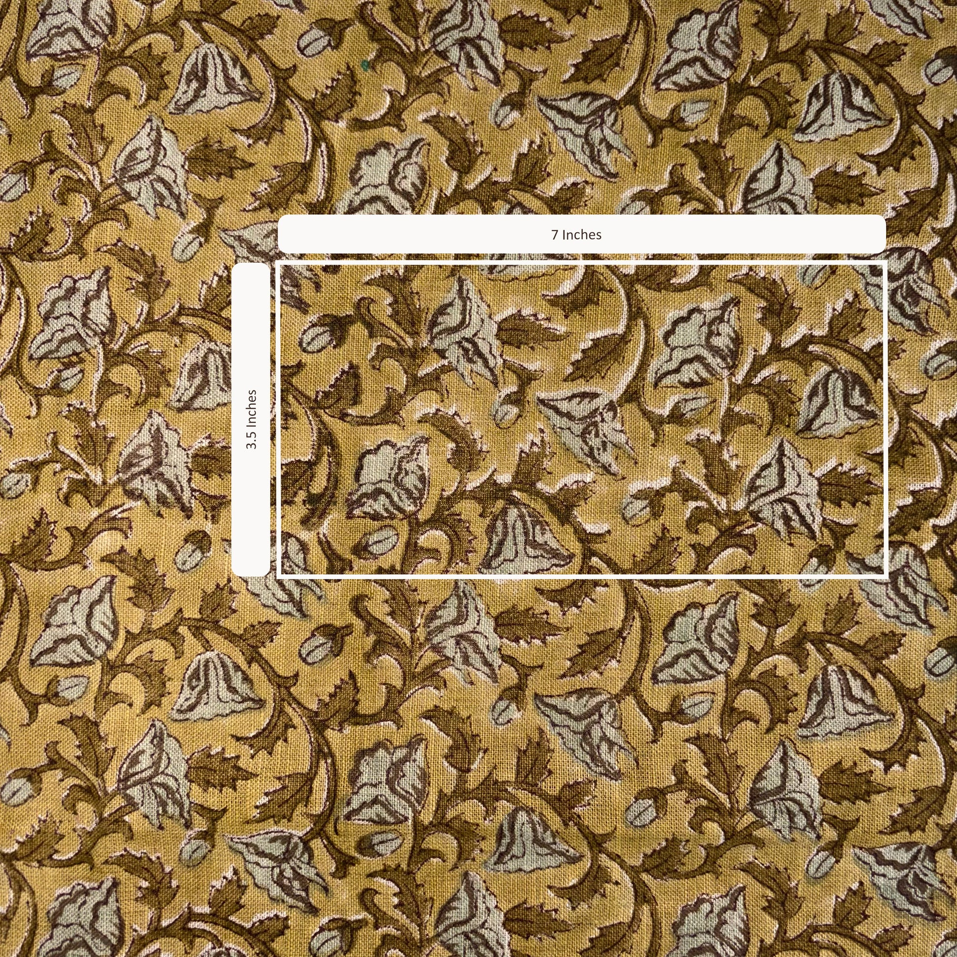 Patterned fabric with a measurement overlay on a yellow background