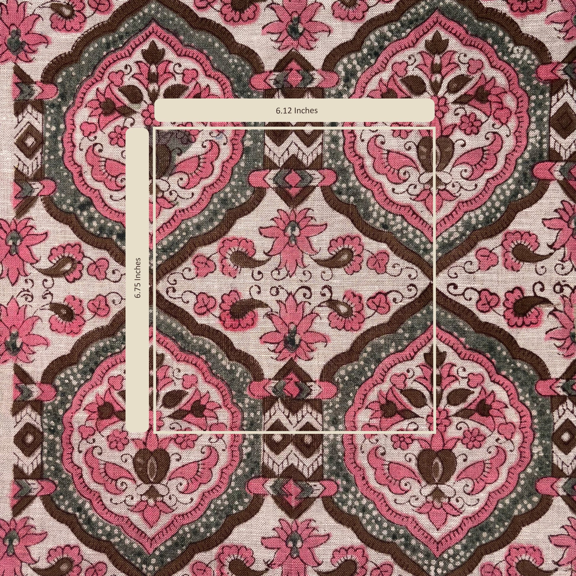 Patterned fabric with pink and brown design on a white background