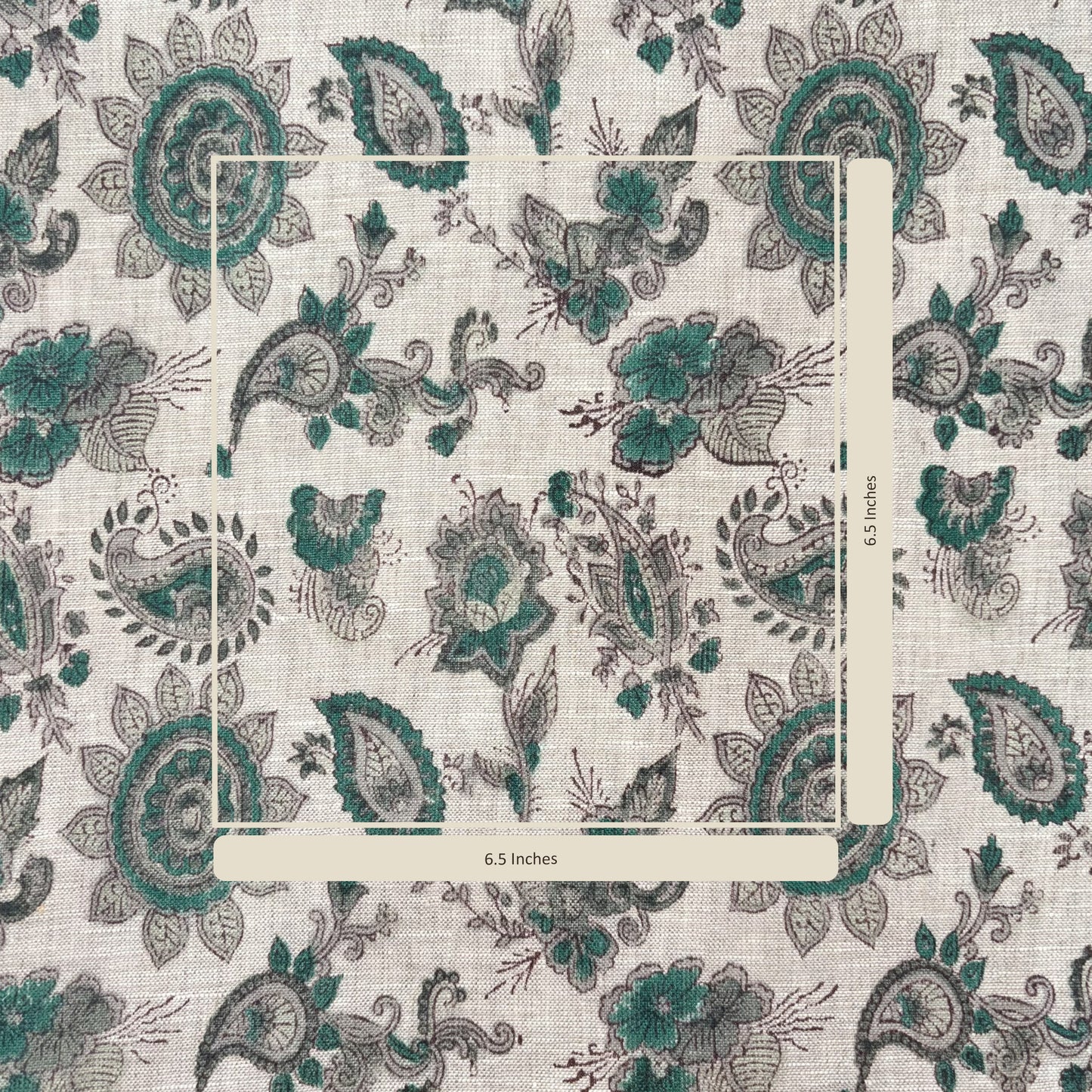 Patterned fabric with peacock designs on a grey background