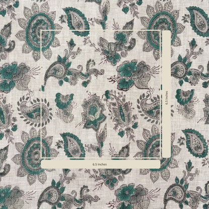 Patterned fabric with peacock designs on a grey background
