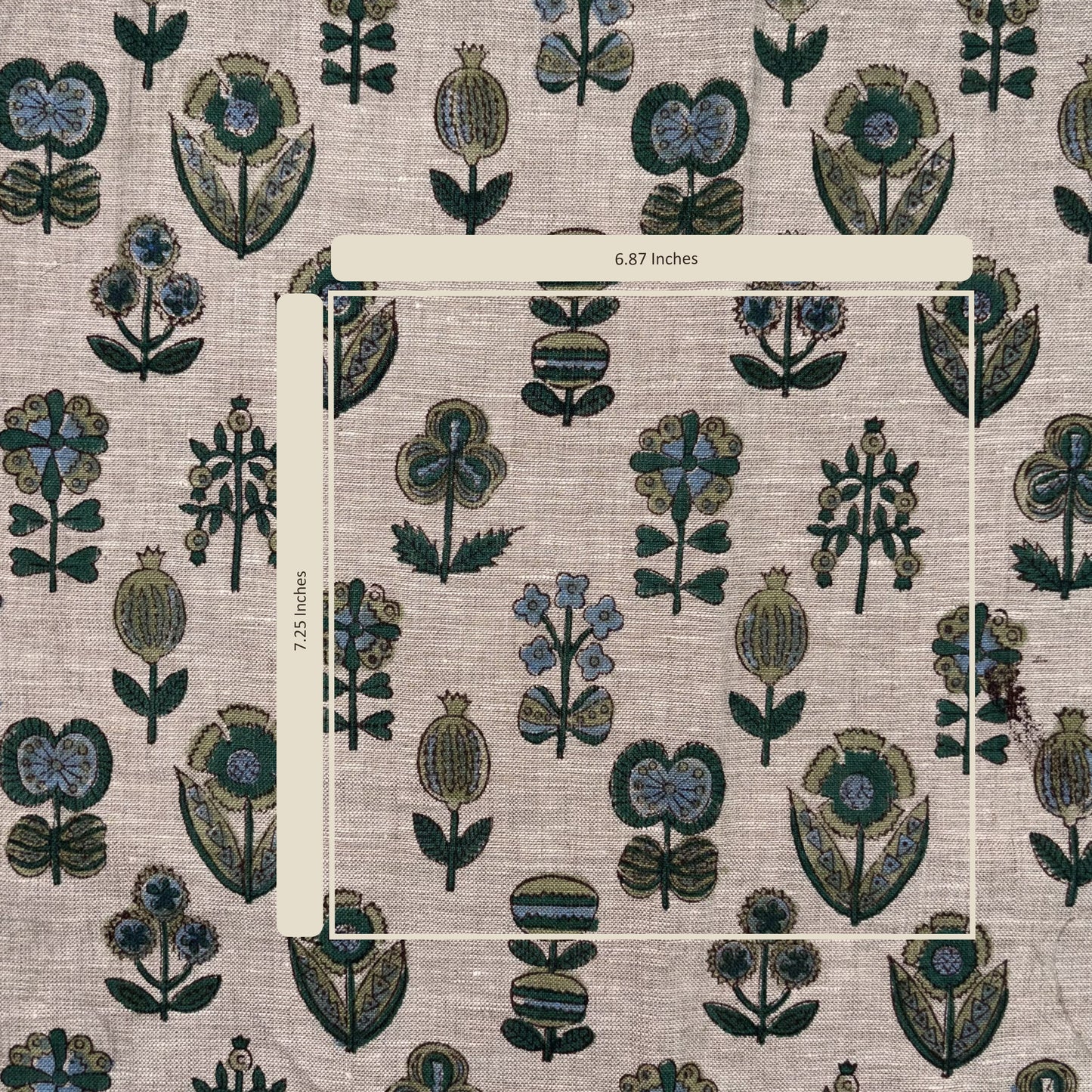 Fabric swatch with floral pattern and measurement scale