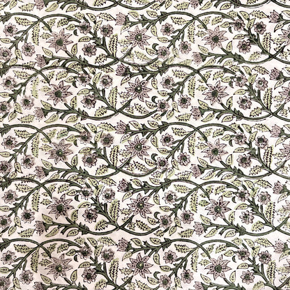 Floral patterned fabric in green on a white background