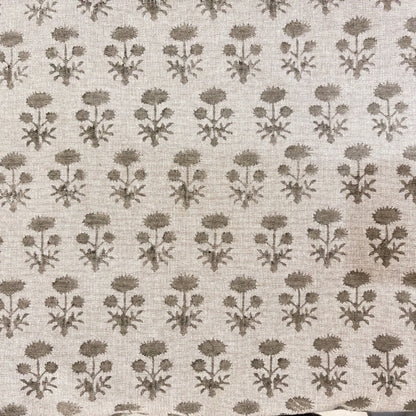 Floral patterned fabric in brown on a white background
