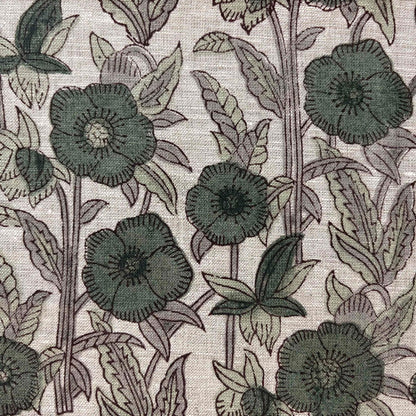 Floral pattern with green flowers and leaves on a grey background