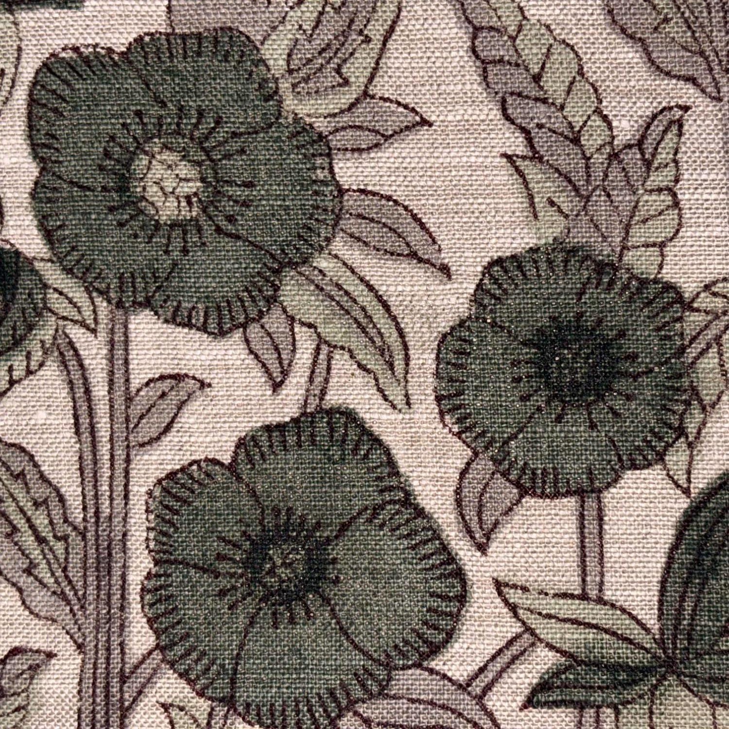 Close-up of a floral pattern with green flowers and leaves on a textured background