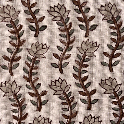 Pattern of stylized leaves and branches on a grey background