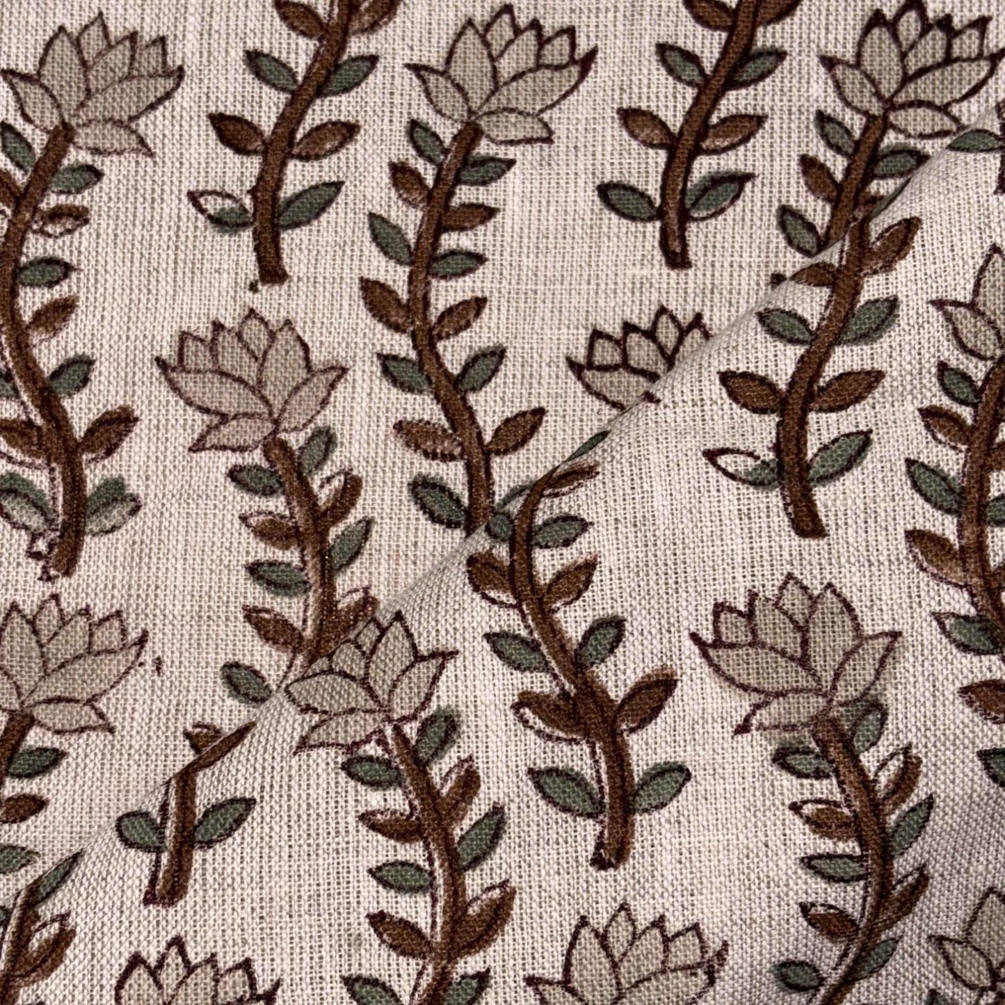 Close-up of fabric with floral pattern on grey background
