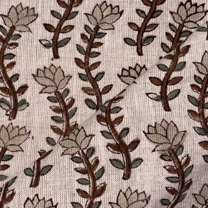 Close-up of fabric with floral pattern on grey background