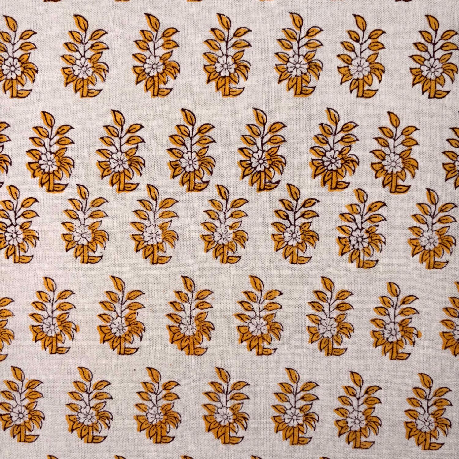Patterned fabric with brown floral design on a beige background