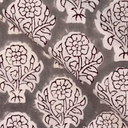 Patterned fabric with floral designs on a gray background