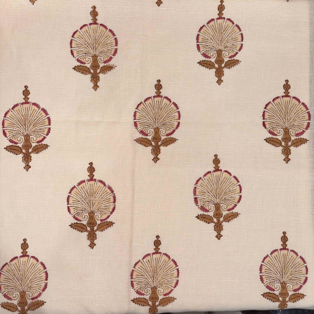 Patterned fabric with decorative elements on a beige background