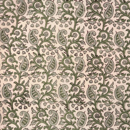 Patterned fabric with green and beige design