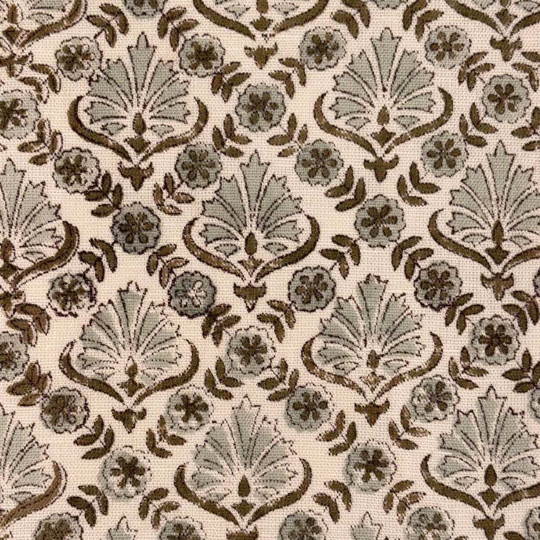 Patterned fabric with decorative design on a beige background