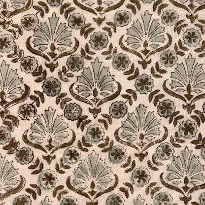 Patterned fabric with decorative design on a beige background