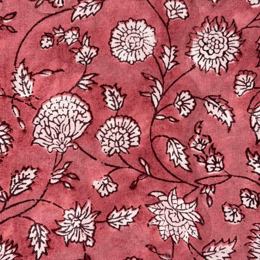 Floral pattern with white flowers on a red background