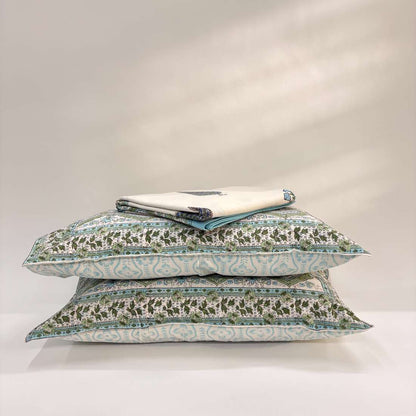 Set of decorative pillows with floral patterns on a white background