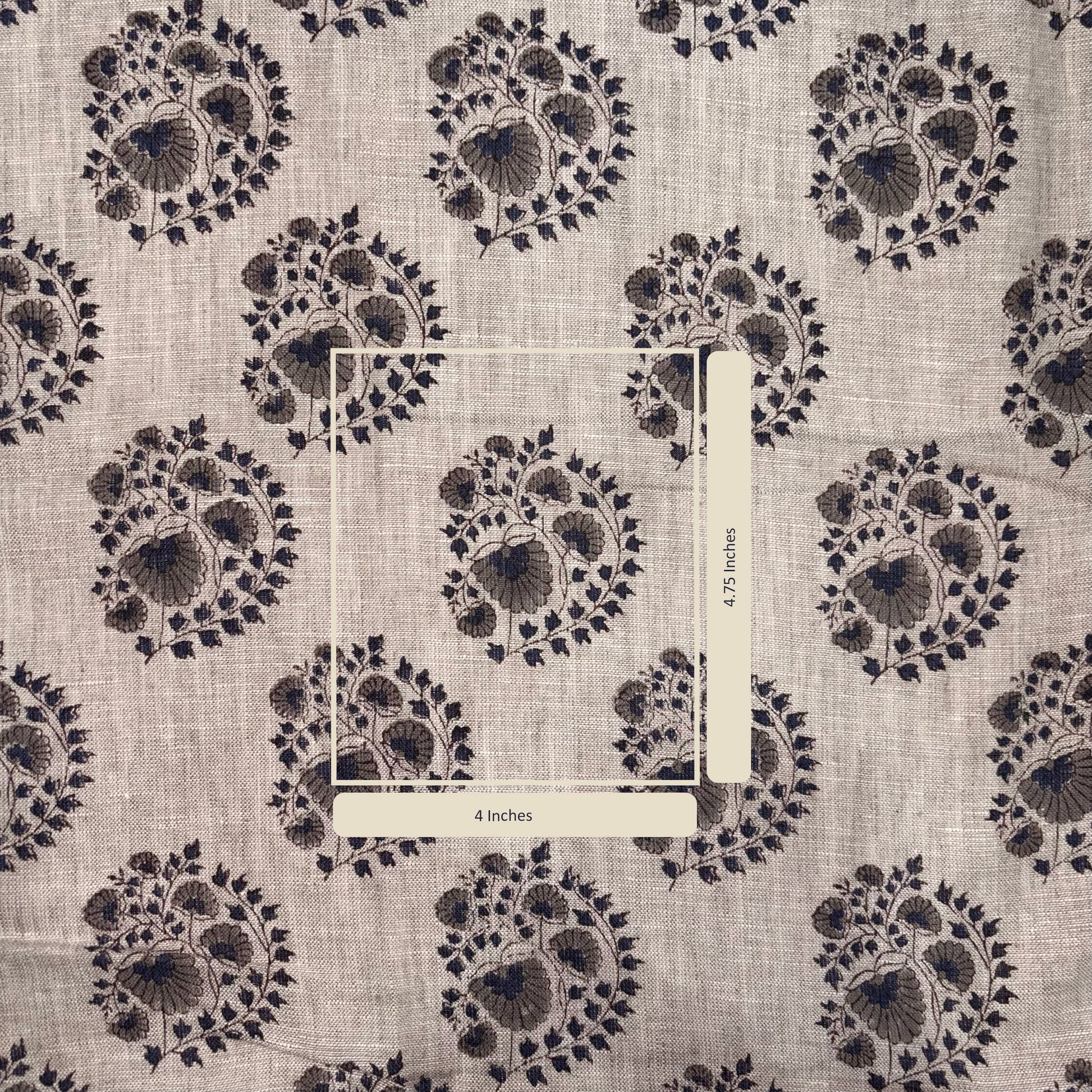Textile with floral pattern and measurement scale on a beige background