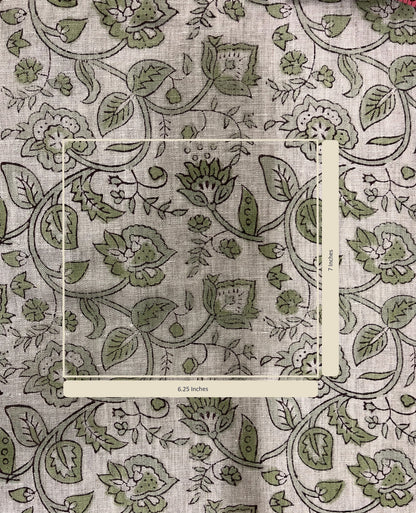 Floral and leaf patterned fabric with a measurement label