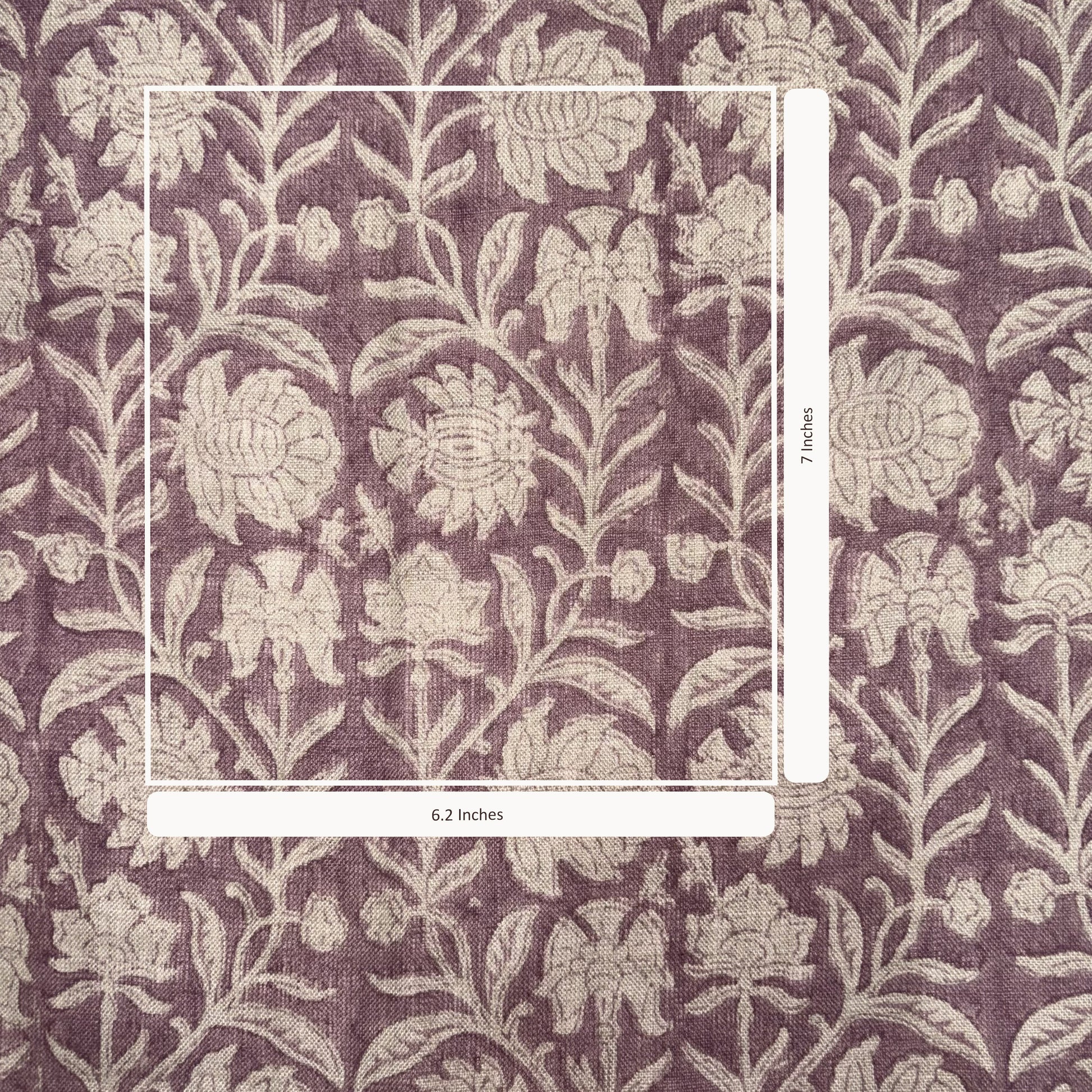 Floral patterned fabric with measurement labels on a purple background