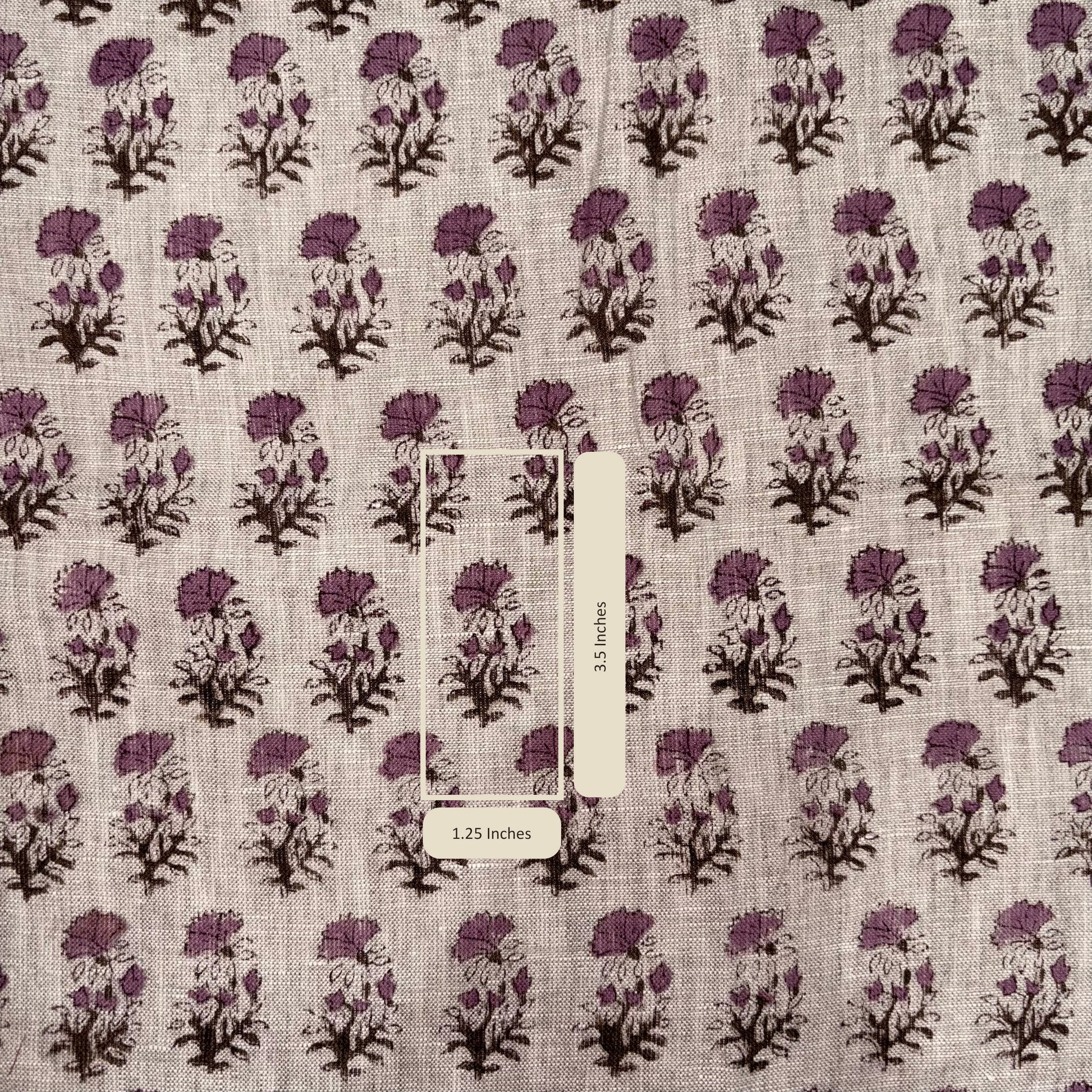 Fabric with purple floral pattern and measurement label