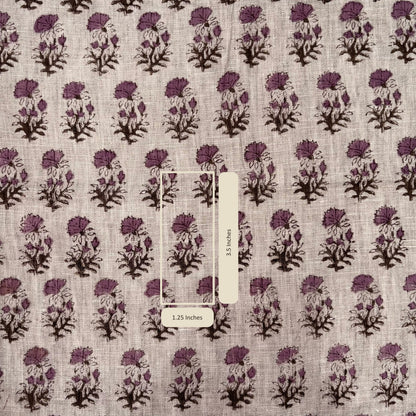 Fabric with purple floral pattern and measurement label