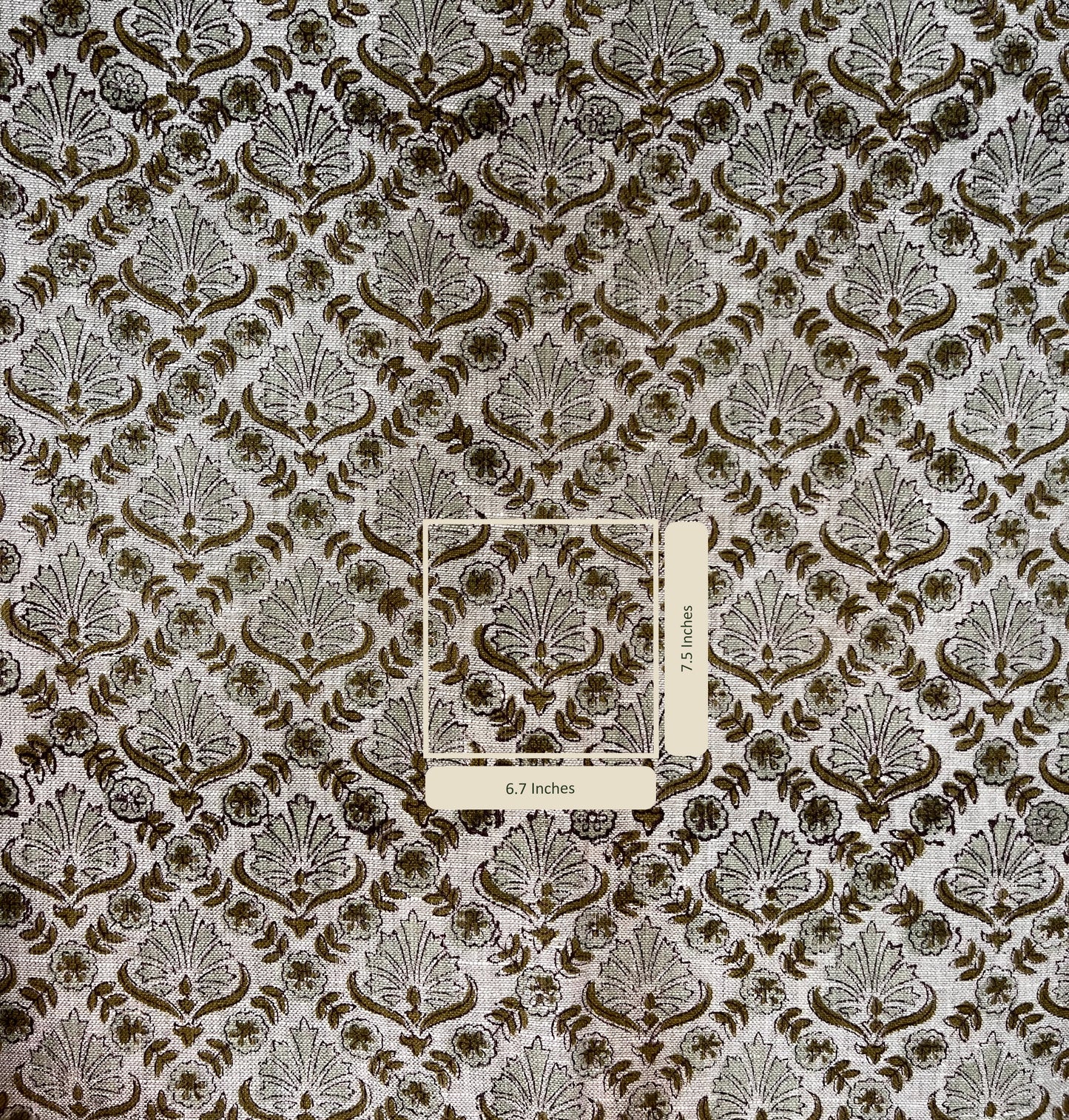 Textile with a detailed pattern and a label on a matching background